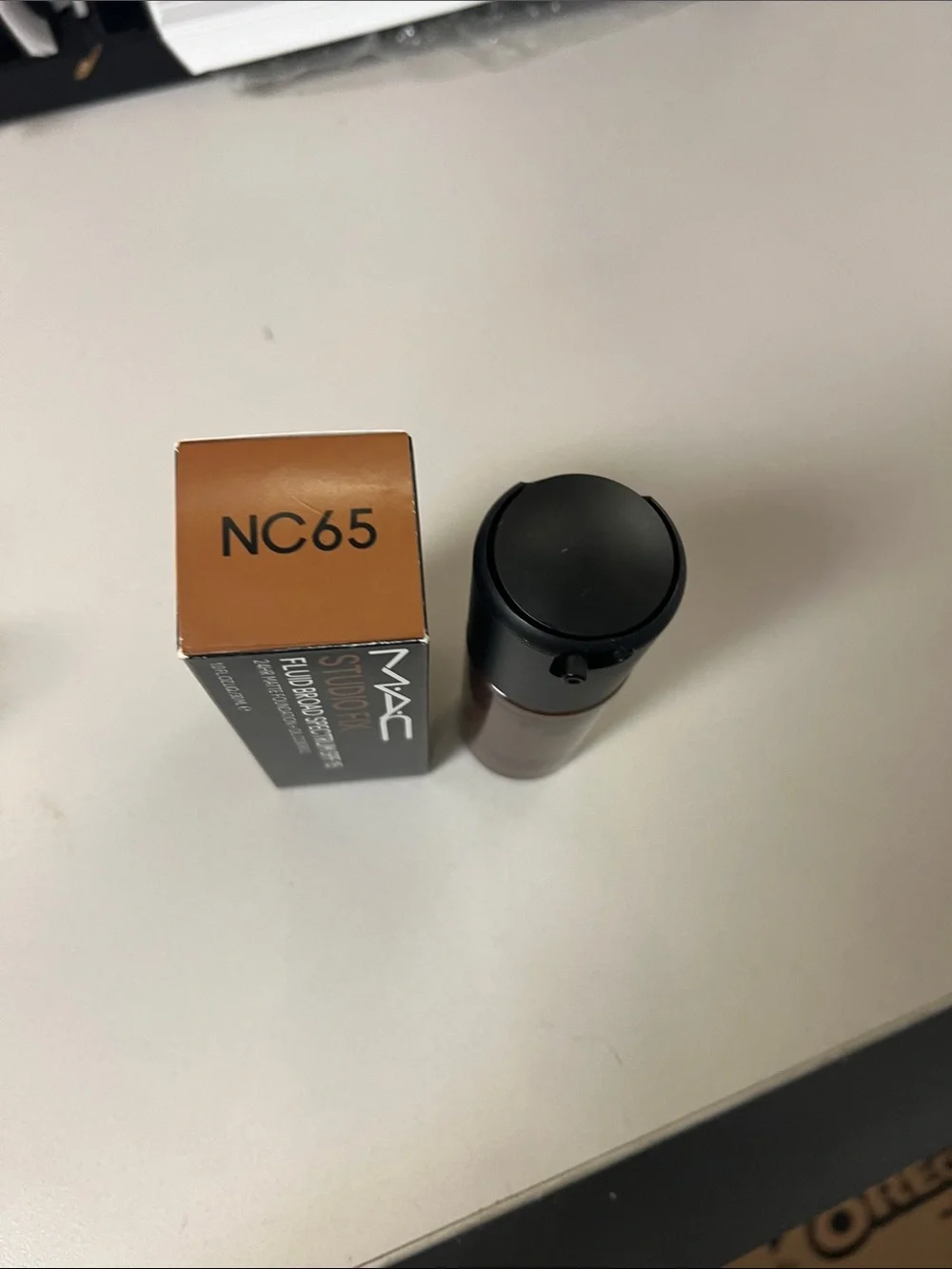 MAC Cosmetics Studio Fix Fluid Foundation NC65 - 30ml (Brown Shade)
